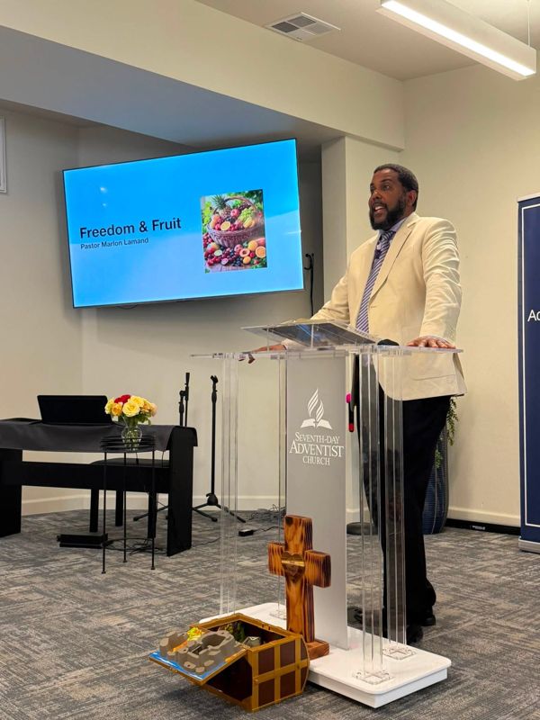 Pastor Lamand preaching on Sabbath morning